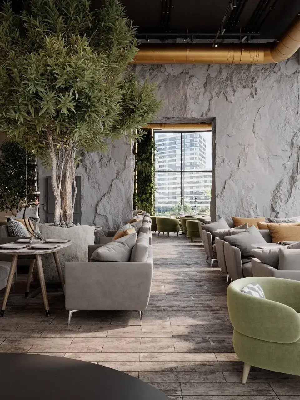 Основной зал ИСТОМА Lounge с каменными стенами и деревьями